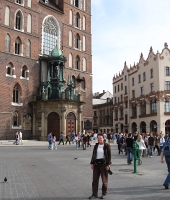 Jean in Kraków's main square, cathedral in background
