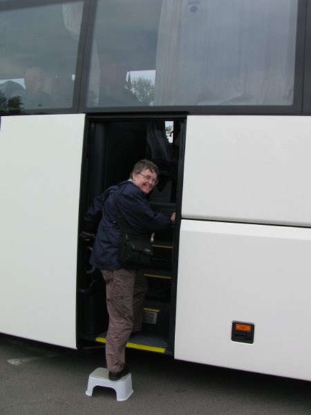 img_4461.jpg - Jean entering rear door of tour bus