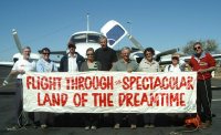 The group with the tour banner